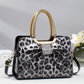 Sac à main en cuir verni léopard avec nœud décoratif et poignée dorée - L29 L12 H21 / Noir
