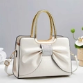 Elegant white bow handbag with crocodile texture and decorative diamond center - Off White