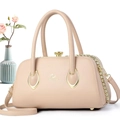 Macro shot of apricot crescent handbag showing lychee pattern leather and gold metal buckle - 29*14*16 / Light Khaki