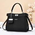 Elegante schwarze Kunstleder-Handtasche mit silbernem Drehverschluss und Schultergurt - Schwarz
