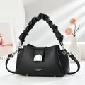 Elegant black lychee grain leather handbag with stylish pleated handle and silver metal accents - Black