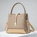 Close-up of beige floral lace pattern and gold-tone hardware on PU leather handbag - 23x12x21 / Khaki