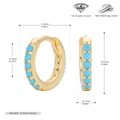 Detail view of gold S925 silver huggie earrings with sky blue 5A cubic zirconia stones - Gold - Turquoise Zirconia