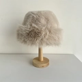Plush faux fur bucket hat in beige, winter warm thermal ear protection style on stand - 56-58cm / Khaki