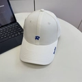 White baseball cap with blue 3D embroidered letter R and Realize script detail - 56-58cm (Adjustable) / Beige