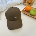 Classic dark brown cotton baseball cap with white Sheenlineess embroidery in a cozy setting - Coffee