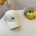 Beige cotton baseball cap with blue Today embroidery on a white table setting - Beige