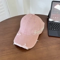 Distressed pink washed denim baseball cap with white Free Style embroidery on a wooden table - 56-60cm (Adjustable) / Pink