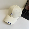 Minimalist cream cotton baseball cap featuring blue embroidered N logo and Newclub detail - 56-60cm Adjustable / Beige