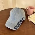 Distressed denim baseball cap in light blue with 3D embroidery on a wooden table - 56-60cm (Adjustable) / Denim Blue