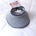 Foldable navy and white striped straw sun hat with a wide brim for summer beach protection - Navy Blue