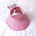 Detailed view of pink and white striped straw sun visor with wide brim and adjustable cord - Rose Red