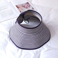 Detail of purple and white striped wide brim sun visor with decorative rear bow - Purple