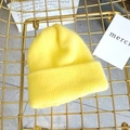 Macro detail of vibrant yellow ribbed knit angora beanie with soft fluffy texture - Approx 54-58cm (Elastic) / Yellow