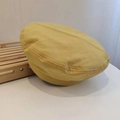 Close-up of yellow canvas beret hat showing fine stitching on wooden tray display - 54-58cm (Adjustable) / Yellow