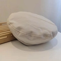 Close-up of beige twill cotton beret featuring visible stitching and soft top construction - 54-58cm (Adjustable) / Beige
