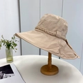 Detail of beige striped sun hat with wide brim, woven rope and fabric bow ornament - 55-59CM / Beige Khaki