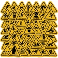 Vue macro de divers autocollants d'avertissement jaunes avec des icônes créatives - Série d'Autocollants d'Avertissement Drôles (T01043314)