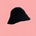 Detail shot of black plush bucket hat texture with thick faux fur winter material - 55-59cm / Black