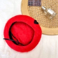 Detail of red plush beret with black heart embroidery and inner adjustable strap - 55-58cm / Red