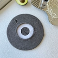 Close-up of grey knit beret showing ribbed texture and white letter P patch detail - One Size / Heather Grey
