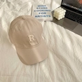 Close-up of beige baseball cap with 3D white embroidered R letter on cotton fabric - 55-59cm (Adjustable) / Beige