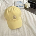 Close-up of light yellow baseball cap with R letter embroidery on soft cotton fabric - 55-59cm (Adjustable) / Light Yellow