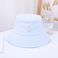 Detailed close-up of light blue cotton bucket hat with white embroidered letter C - 55-59CM / Light Blue
