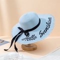Detail of light blue straw sun hat featuring Hello Sunshine embroidery and a black ribbon - 55-59cm (With Adjustable String) / Blue