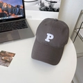 Close-up of charcoal grey cotton baseball cap with white embroidered P on a desk - 60-64cm (Adjustable) / Gray