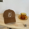 Close-up of cat embroidery and Japanese text on a brown cotton canvas baseball cap - 55-58cm (Adjustable) / Brown