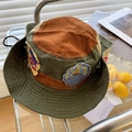 Detail of color-block canvas sun hat with vintage embroidery patches and adjustable chin cord - Adult Size (56-58cm) / Color Block