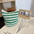 Close-up detail of green and white striped knit beanie featuring cute cat ear design points - One Size (55-58cm) / Green and White Striped