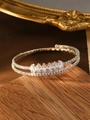 Detail of silver double-layer bracelet featuring marquise-cut zircons on a wooden stand - Silver (Six Marquise Zirconia)