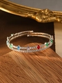 Detalle de brazalete de doble espiral plateado con piedras marquesas de colores - Multicolor (Zirconia Marquise)