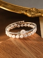 Detail of multilayer spiral bracelet featuring pearls and sparkling cubic zirconia stones - Silver (Large Pearl)