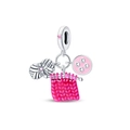 Detailed view of pink enamel knitting charms featuring a yarn ball and button - Pink Yarn Ball Button Knitting Style