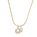 Close-up of golden flat chain necklace with shell pendant and irregular white pearl - Square Shell & Baroque Pearl Charm (STPN02) / Gold