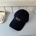 Navy blue cotton baseball cap featuring white Nice embroidery and a classic curved brim - 56-58cm Adjustable / Navy Blue