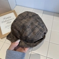Artistic mixed brown and black textured cloud beret hat for women held in hand - 56-58cm / Brown