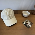 Beige cotton baseball cap with black embroidered Lucy lettering and curved wide brim - Beige