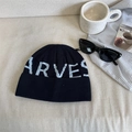 Vintage knitted beanie with pixelated letters and rolled edge in a lifestyle layout - 56-58cm / Navy Blue