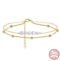 Double-layer S925 sterling silver anklet with pearls and gold beads on white background - 925 Sterling Silver/Natural Freshwater Pearl / 14K Gold
