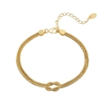 Vista macro de pulsera de cuentas doradas de varias capas con nudo y marca S925 - Oro de 14K