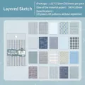 Blue vintage scrapbooking paper set with 20 unique sheets for journaling and DIY crafts - Layered Sketch (Blue)