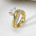 Golden S925 silver ring set featuring a pear-cut zircon and pavé-set wedding band - US 5 / Gold Main And Side Ring
