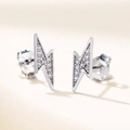 Macro shot of S925 sterling silver lightning earrings with pavé cubic zirconia stones - White Gold with White Zirconia