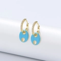 Detailed close-up of 925 stamp on gold-plated hoop earrings with blue enamel pendant - 925 Silver / Turquoise
