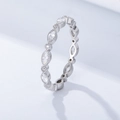Macro side view of S925 silver ring featuring marquise cut zircons and milgrain edges - US 5 / White