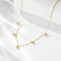Minimalistische gouden ketting met vijf sprankelende zirkoon hangers op witte basis - 925 zilver / Goud